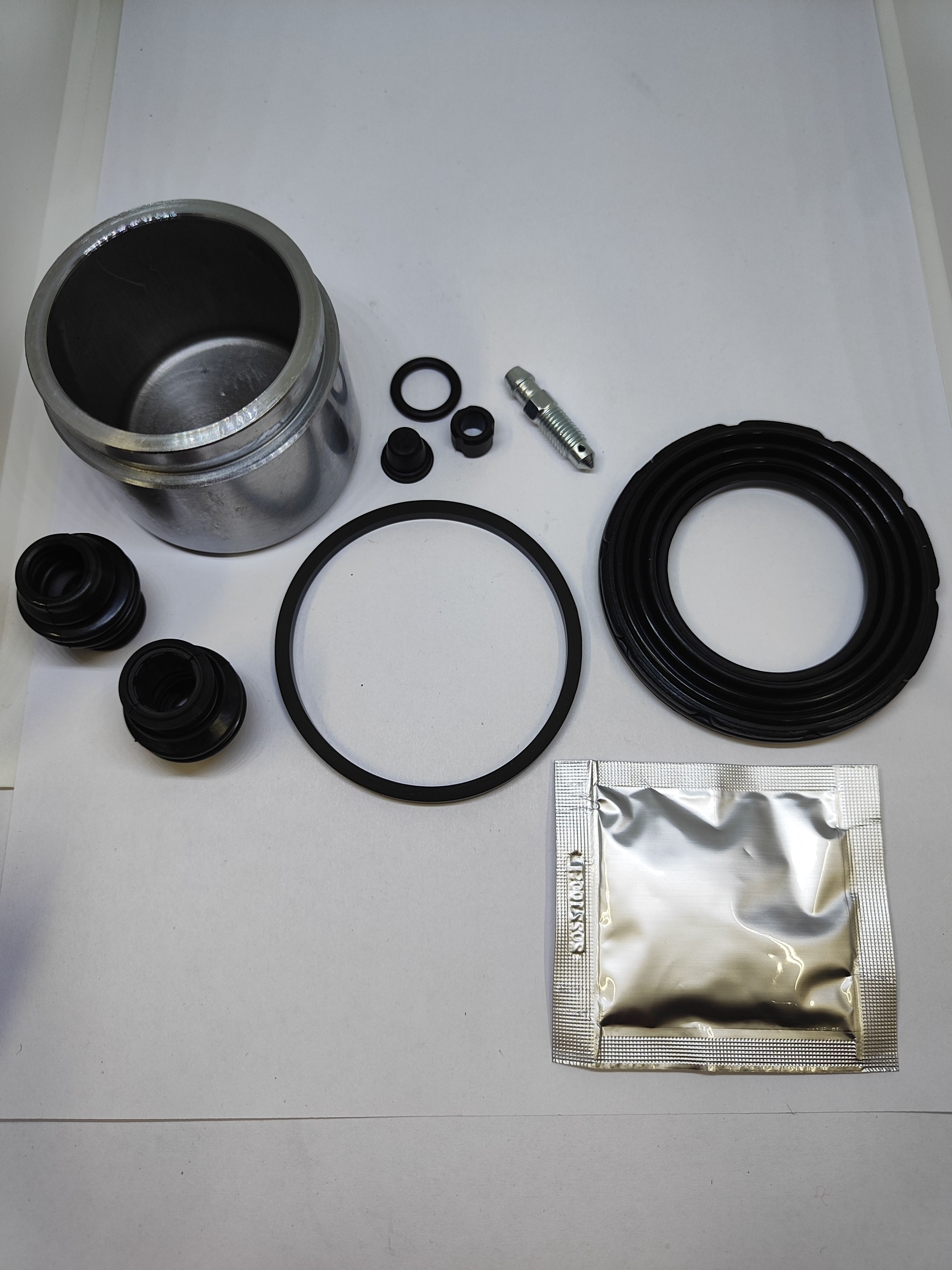 Ремкомплект суппорта NISSAN, переднего (d=60мм) (к-т 7 дет) EPDM. D1ABMJE00A "ROSTECO", артикул 22881 — фото автозапчасти